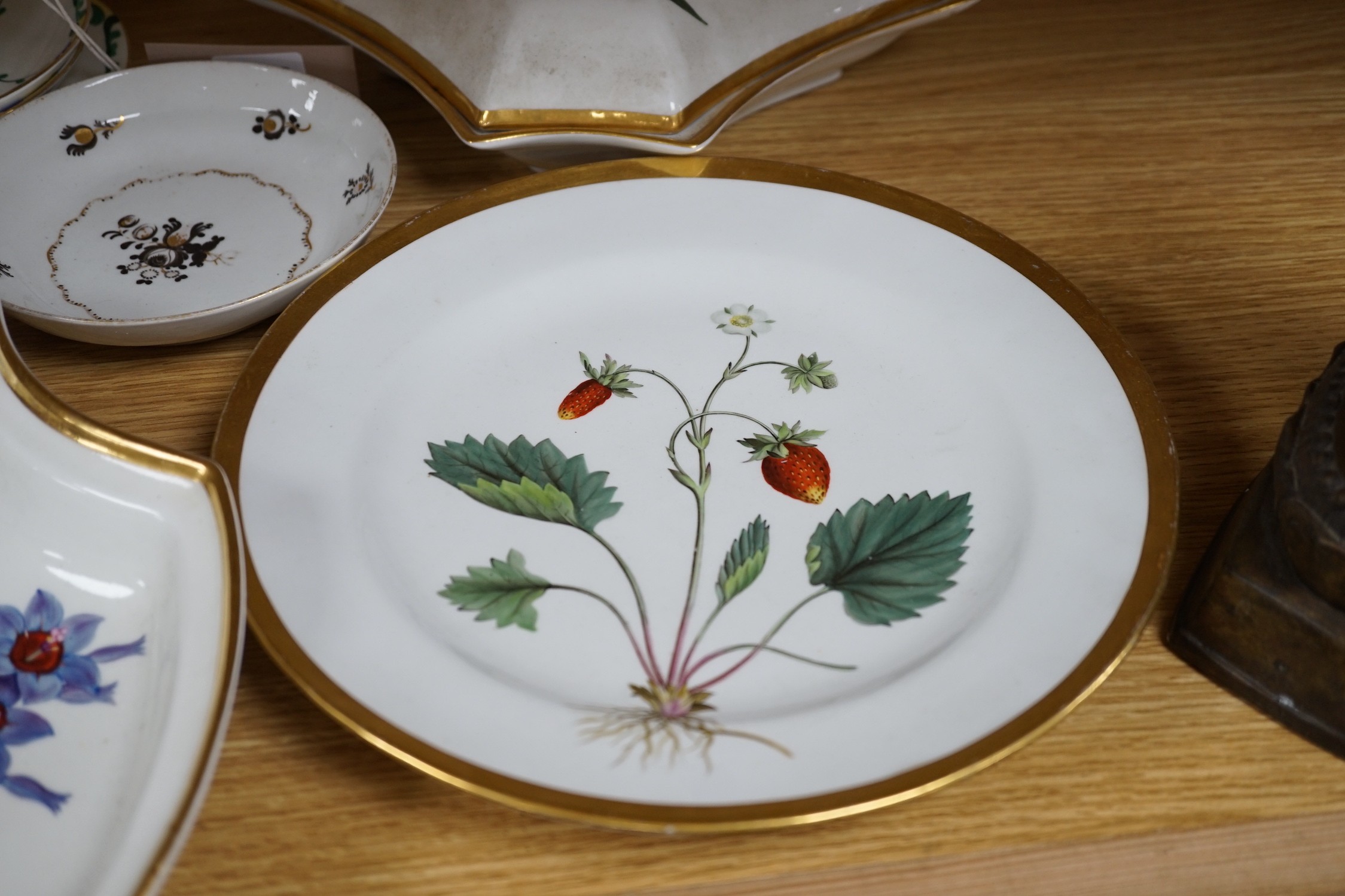 A Chamberlains Worcester botanical part supper set, c.1800-10, an English porcelain saucer and Bisto cups and saucers